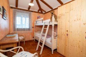 Postel nebo postele na pokoji v ubytování Toscana