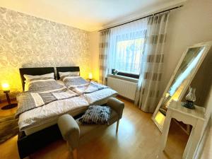 Postel nebo postele na pokoji v ubytování Ferienwohnung Boldt