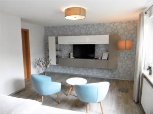 Ruang duduk di Ferienwohnung "Muschelbank"