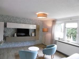 Ruang duduk di Ferienwohnung "Muschelbank"