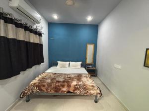 Postel nebo postele na pokoji v ubytování Unity homestay