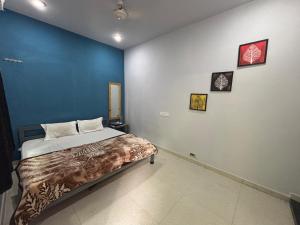 Postel nebo postele na pokoji v ubytování Unity homestay