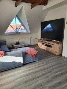 TV a/nebo společenská místnost v ubytování Ferienwohnung Hofmann + 21 fotografií