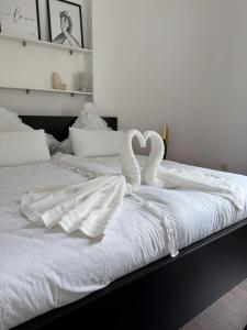 Ένα ή περισσότερα κρεβάτια σε δωμάτιο στο Seibel's SUITES - Appartement Wohnung mitten in Rüttenscheid