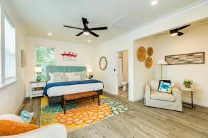 a bedroom with a bed and a couch at Hidden Paradise in Galveston +51 photos