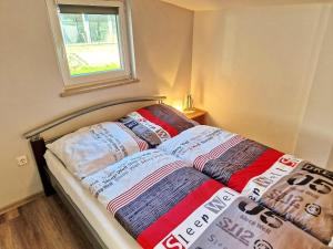 Ένα ή περισσότερα κρεβάτια σε δωμάτιο στο Ferienhaus Ostseewind - ABC583 +19 φωτογραφίες