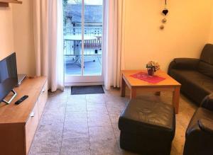 TV a/nebo společenská místnost v ubytování Strandpalais 10