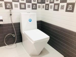 Koupelna v ubytování Grand Infinite Home Stay