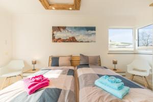 Postel nebo postele na pokoji v ubytování Ferienhaus "SAPHIR"