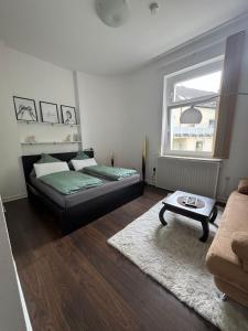 Ένα ή περισσότερα κρεβάτια σε δωμάτιο στο Seibel's SUITES - Appartement Wohnung mitten in Rüttenscheid
