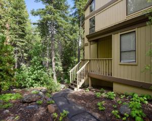 a house with a staircase leading to the front yard at Enjoy Forest Views Retreat at Kingswood Village in Kings Beach