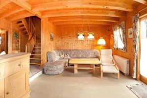 Posezení v ubytování Ferienhaus Fuchsweg im Feriendorf Reichenbach F25a + 9 fotografií