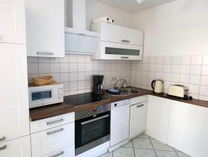 Køkken eller tekøkken på Fewo Rosenhof TW 110