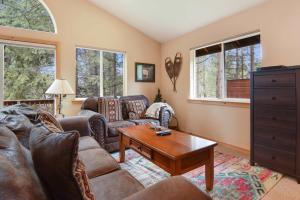 a living room with couches and a coffee table at Kings Beach Bliss Walk to Outdoor Fun in Kings Beach