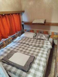 Postel nebo postele na pokoji v ubytování GH Bella