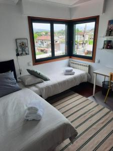 Postel nebo postele na pokoji v ubytování CASA CASTRO + 33 fotografií