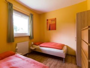 Postel nebo postele na pokoji v ubytování Mohnblume_EG