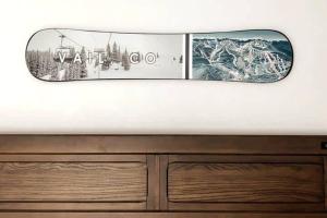a white car with two pictures on the side of it at Studio Shred Your Cozy Mtn Refuge in Vail