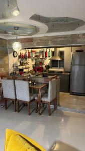 Una cocina o cocineta en Apartamento curiel
