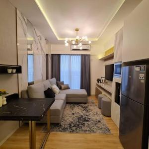 Η κουζίνα ή μικρή κουζίνα στο Ruby Tower Apartment 2BR