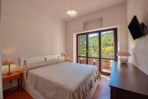 Ένα ή περισσότερα κρεβάτια σε δωμάτιο στο Elegant Hideaway