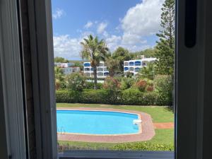 Bazén v ubytování Th29 Deluxe beachfront apartment in Tamarit nebo v jeho okolí