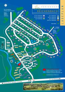 un mapa de un estacionamiento con autos en Ferienhaus Fuchsweg im Feriendorf Reichenbach F21, en Nesselwang