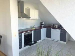 Kuchyň nebo kuchyňský kout v ubytování Ferienwohnung Alte Räucherei DH-60114