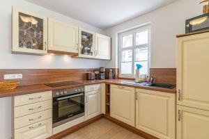 Η κουζίνα ή μικρή κουζίνα στο Landhaus Boddenhus +8 φωτογραφίες