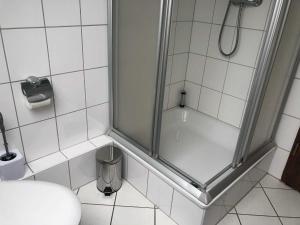 Koupelna v ubytování Ferienhaus in Dornumersiel 20-033