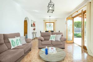A seating area at Villa Maria Celia by Villa Plus