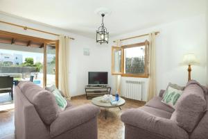 A seating area at Villa Maria Celia by Villa Plus