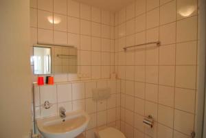 Ein Badezimmer in der Unterkunft Villa Strandperle, Whg. 10