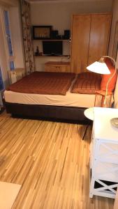 Voodi või voodid majutusasutuse Haus Having WE 301 "Lütte Stuv" toas