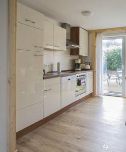 Kuchyň nebo kuchyňský kout v ubytování K01 Fischerkaten Haus HELENA max 5 + 6 fotografií