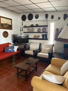 Posezení v ubytování Casa l’orizzonte azzurro