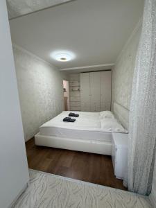 Posteľ alebo postele v izbe v ubytovaní Kharkovlux