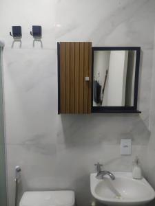Ένα μπάνιο στο Apartamento Cabine 13