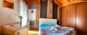 Llit o llits en una habitació de Casetta fra ely