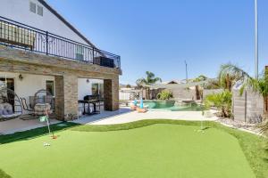 an image of a house with a putting green at Outdoor Entertaining Space Family Henderson Home in Las Vegas