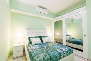 Letto o letti in una camera di GRAND CARIBE STUDIOS and SUITES playa LOS CORALES