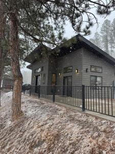 a house with a fence in front of it at The Bonnie View in Keystone +22 photos