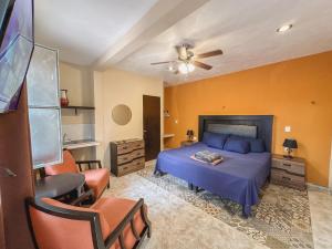 Postel nebo postele na pokoji v ubytování Casa Daniels Guesthouse + 37 fotografií