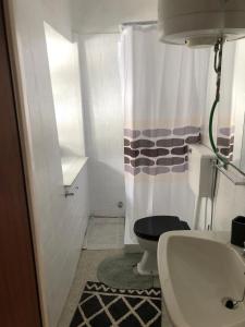 a bathroom with a toilet and a sink at Il Rifugio della Baita in Viù +40 photos