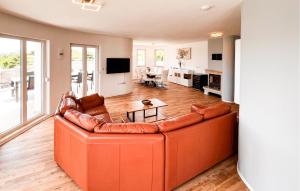 a living room with a couch and a table at Amazing Home In Crikvenica With Wifi in Crikvenica