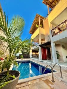 an image of a villa with a swimming pool at Condomínio Harmonia in Pipa