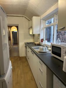 Kuchyň nebo kuchyňský kout v ubytování Stoke Staycation The Quiet Corner + 22 fotografií