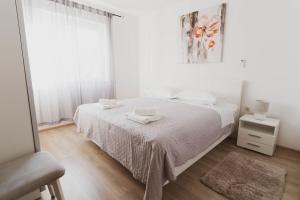 Postel nebo postele na pokoji v ubytování House Villa Petar 1