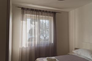 Postel nebo postele na pokoji v ubytování House Villa Petar 1
