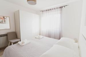Postel nebo postele na pokoji v ubytování House Villa Petar 1